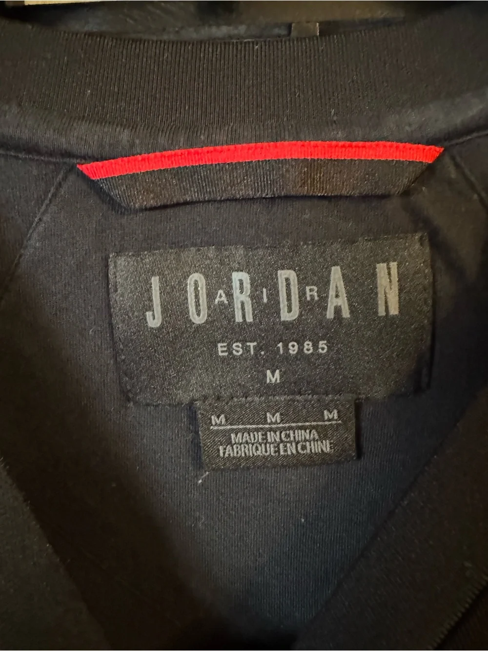 Jordan Sportswear Flight Tech Shield Crewneck Sweatshirt in black.